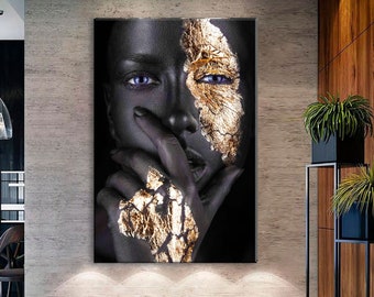 May include: A black and gold abstract portrait of a person with their hand covering their mouth. The person's face is painted with gold leaf and their eyes are closed.