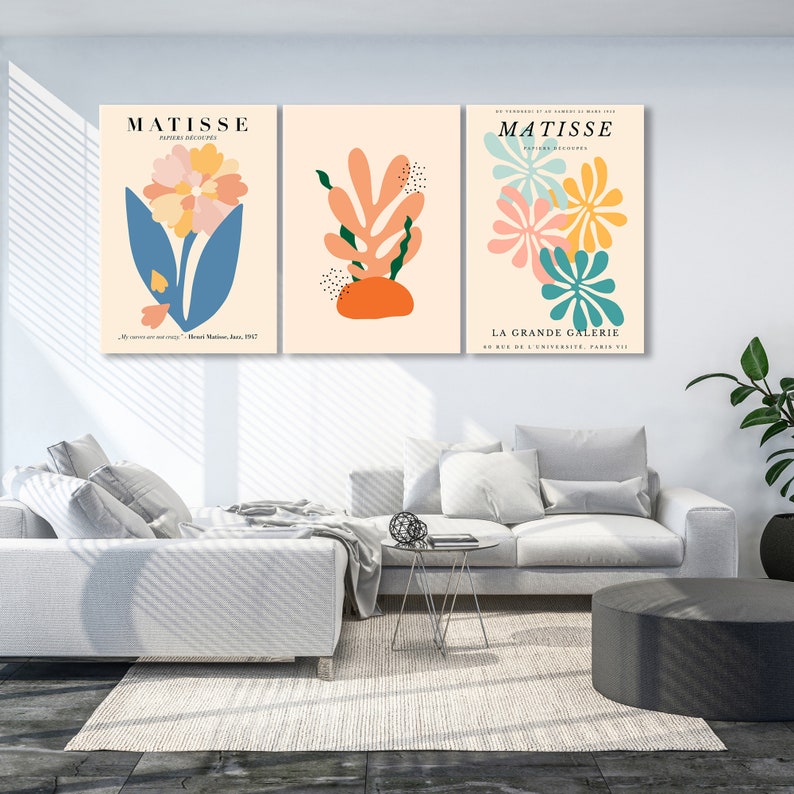 May include: Three abstract art prints featuring colorful floral and leaf designs. The prints are titled "Matisse" and feature the text "Paper Decoupages" and "La Grande Galerie".