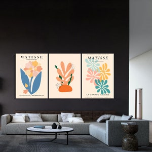 May include: Three colorful abstract art prints featuring floral and leaf designs. The prints are titled "Matisse" and "La Grande Galerie".