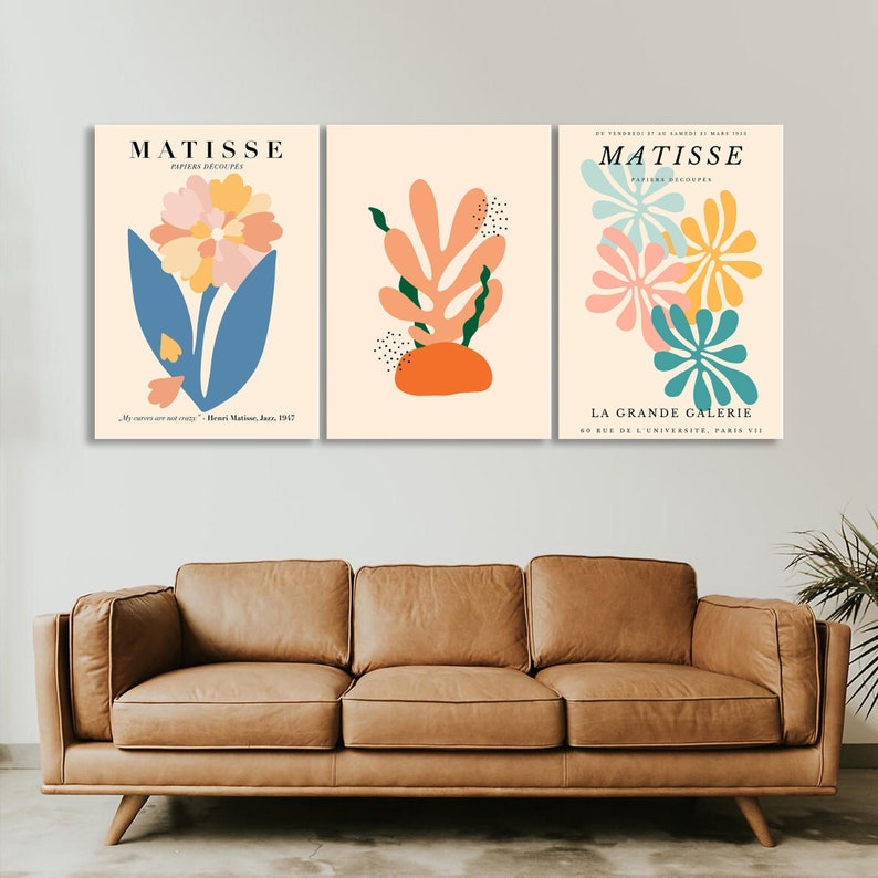 May include: Three abstract art prints featuring colorful cut-out shapes and the text "MATISSE PAPIERS DECOUPES" and "LA GRANDE GALERIE 60 RUE DE L'UNIVERSITE, PARIS VII".