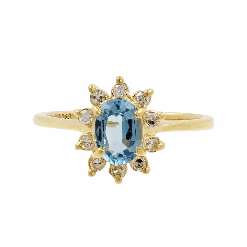1.35ctw 14k Yellow Gold Oval Blue Topaz Round Diamond Halo Cocktail Ring