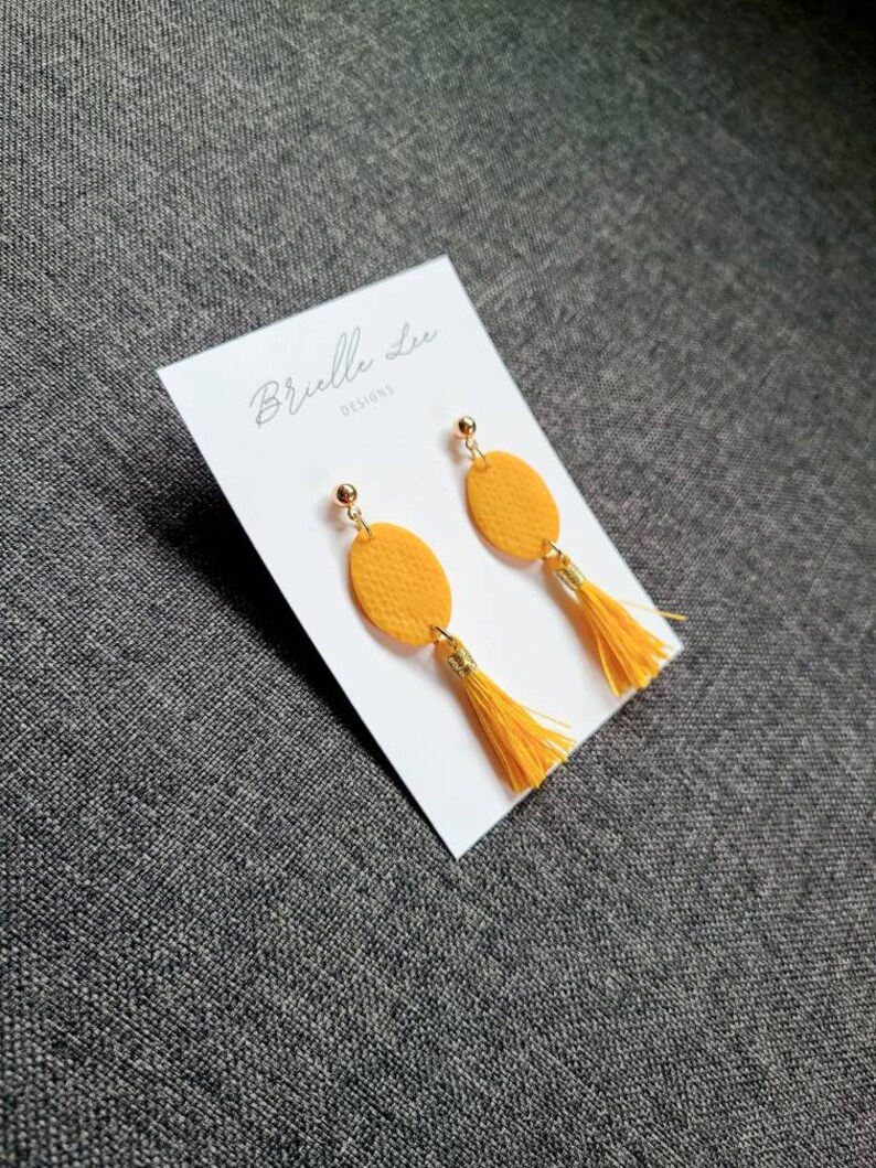 Polymer clay tassel earrings oval dangle earrings with tassels yellow and gold earrings handmade clay earrings yellow jewelry