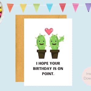 May include: A printable birthday card featuring two cartoon cacti with smiling faces and a heart between them. The text reads "I hope your birthday is on point."