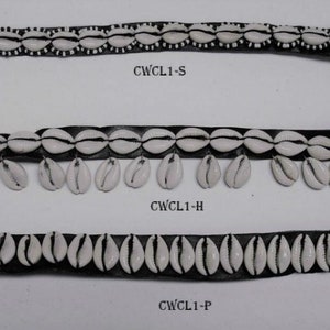 May include: Three black leather bracelets featuring white cowrie shells. The top bracelet has a single row of shells, the middle bracelet has a single row of shells with a fringe of shells, and the bottom bracelet has a single row of shells. The bracelets are labelled "CWCL1-S", "CWCL1-H", and "CWCL1-P".