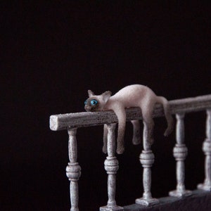 Miniature cat, railing siamese artisan pet in 1:12 twelfth scale for doll house of diorama. Fluffy siamese kitten toy