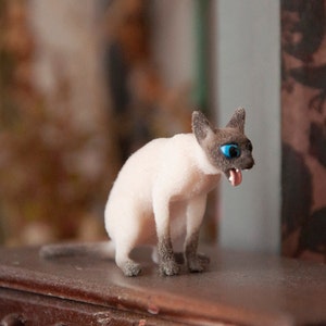 Miniature cat vomintng, artisan pet in 1:12 twelfth scale for doll house of diorama. Fluffy siamese kitten toy