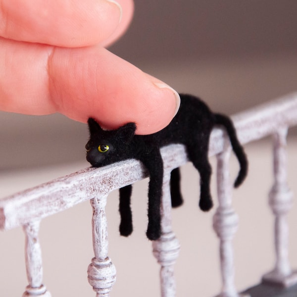 Miniature cat, railing artisan pet in 1:12 twelfth scale for doll house of diorama. Fluffy black kitten toy