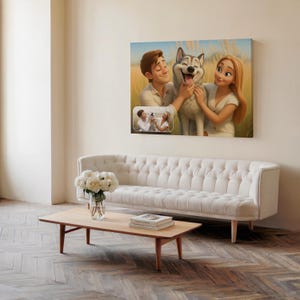 May include: A canvas print featuring a cartoon illustration of a couple with a smiling husky dog. The artwork hangs above a white tufted sofa and a wooden coffee table. A smaller image is inset at the bottom left of the main image.
