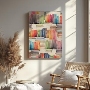 May include: A canvas print featuring a watercolor illustration of a bookshelf filled with colorful books. The books are stacked in rows, with spines in shades of red, blue, green, and yellow. The artwork is displayed in a well-lit room.