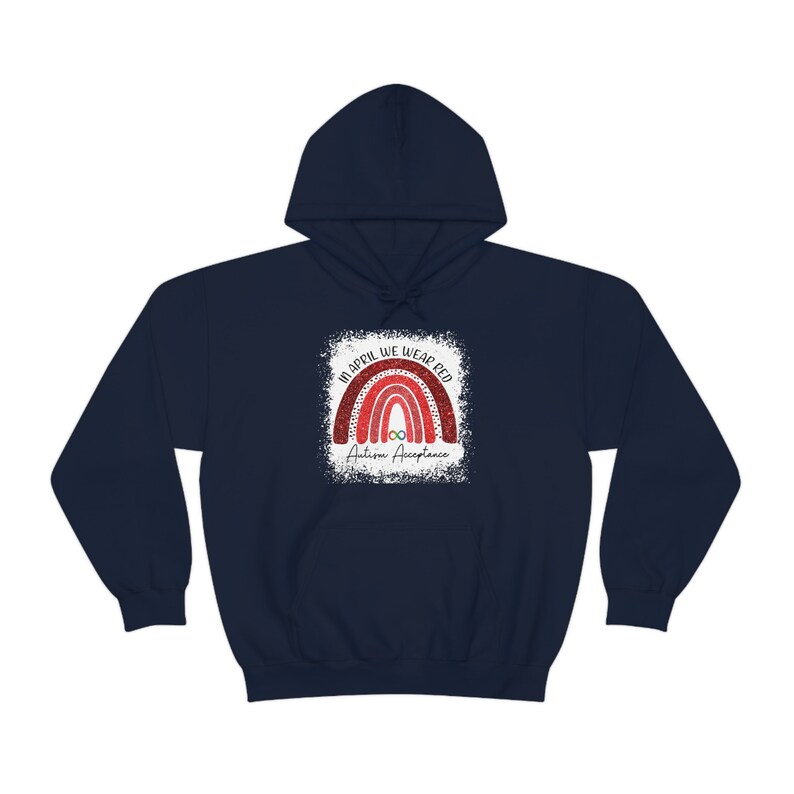 May include: Navy blue hoodie with a red glitter rainbow and the text "In April We Wear Red Autism Acceptance".
