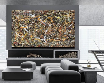 May include: Abstract expressionist painting with a dark background and splatters of white, orange, yellow, and brown paint. The artwork is displayed above a modern fireplace in a living room setting.