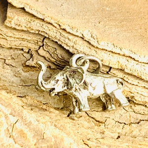 Sterling silver tiny elephant pendant charm