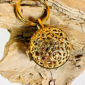 vintage Open Pattern Keychain Yoga Wish Box Holds Carillon Harmony Ball Angel Caller Wish Box