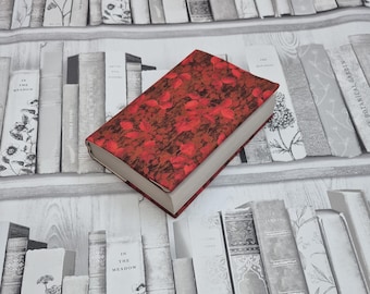 Adjustable padded book cover, personalised paperback dust jacket for a book lovers gift. Red leaves pattern.