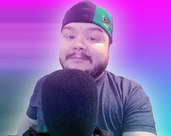 May include: A man wearing a green and black hat with a logo is holding a black microphone in front of a purple and blue gradient background.