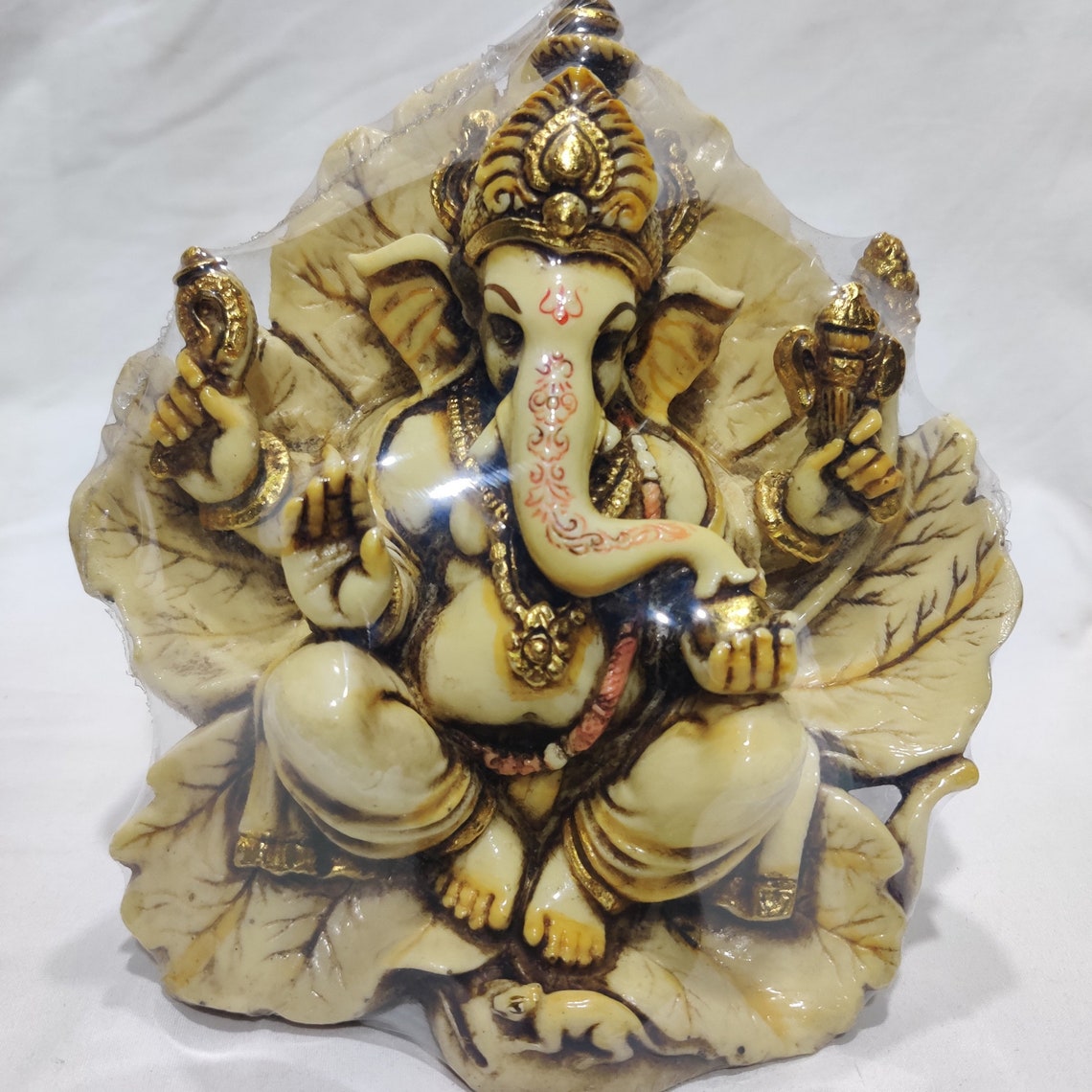 Resin Ganesha Statue Lord Ganesha Sitting On A Leaf Ganesha Etsy