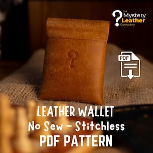 May include: A brown leather wallet with a question mark embossed on the front. The wallet is a PDF pattern, stitchless, and no sew. The Mystery Leather Company logo is in the upper right corner.