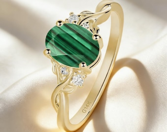 Anillo de compromiso vintage de malaquita ovalada en oro amarillo de 14 quilates con forma de rama: protección y sanación.