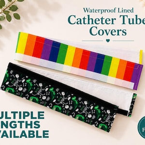 May include: Two waterproof lined catheter tube covers. One cover features a vibrant rainbow stripe pattern, while the other displays a black background with a green dinosaur skeleton print. Text reads: Waterproof Lined Catheter Tube Covers.