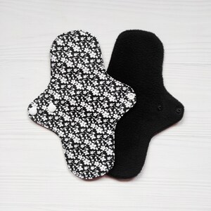 Reusable cloth pads with flowers. Menstrual panty liners. Organic flannel or fleece to the skin. Zero waste panty liners.