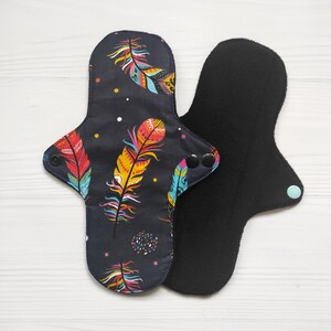 Cotton cloth pads with feathers. Reusable sanitary napkins. Flannel or fleece bamboo to the skin. Zero waste panty liners.