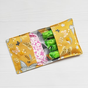 Borsa porta pad gialla con farfalle. simpatico astuccio in cotone. comoda custodia per salvaslip. Porta tamponi.