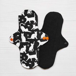 Reusable cloth pads with cats. Zero waste menstrual pads. Organic panty liners.