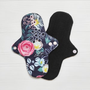 Cotton cloth pads with flowers. Reusable menstrual pads. Organic flannel or fleece the skin. Zero waste panty liners.