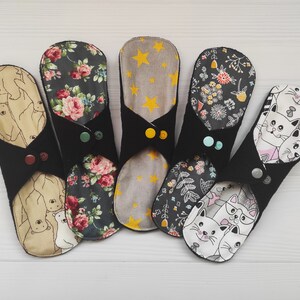 RANDOM reusable cloth pads. menstrual organic panty liners. Fabric sanitary napkins. Flannel or fleece to the skin to choose from.