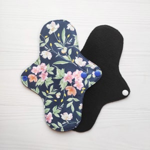 Cotton cloth pads with flowers. Reusable menstrual pads. Organic flannel or fleece the skin. Zero waste panty liners.