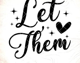 以下が含まれることがあります： 「Let Them」というテキストが筆記体で書かれた白黒のグラフィックデザイン。デザインにはハートと星が含まれています。