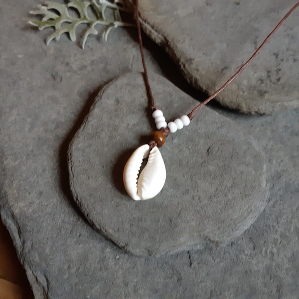Single real cowrie shell necklace. Natural handmade jewelry. Surf jewelry for men and women, tribal sea jewelry, handmade african necklace