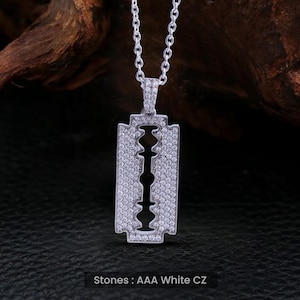 0.5 Cttw Round Cut Natural Diamond Silver and Gold Pendant 0.5 Cttw Round Cut Natural Diamond Silver and Gold Pendant