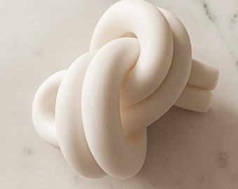 Overhand clay knot in porcelain home decor paperweight ornament
