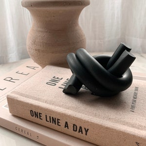 Black knot home decor paperweight