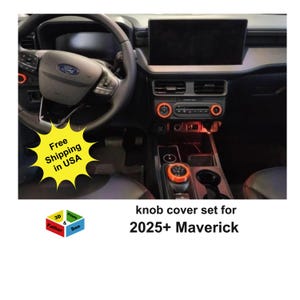 May include: Interior view of a Ford Maverick dashboard with a knob cover set. The dashboard is black with orange accents around the controls. The image includes the text "knob cover set for 2025+ Maverick".
