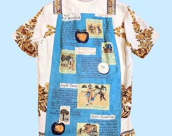 Camisa de lino vintage reciclada, hecha a mano y con cuello abotonado, reinterpretada: Mantel con recetas de manzanas de los años 70, color crema, marrón y amarillo, con flores de los años 70.