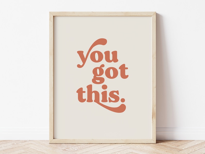 K&ouml;nnte beinhalten: Ein gerahmter Druck mit dem Text "you got this." in Terrakotta-Orange auf cremefarbenem Hintergrund.