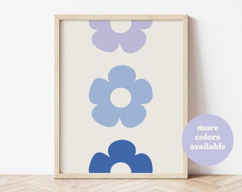 Könnte beinhalten: Ein gerahmter Druck mit einem vertikalen Design aus drei stilisierten Blumen in Blautönen und Lila. Die Blumen haben einen einfachen, Retro-Look.