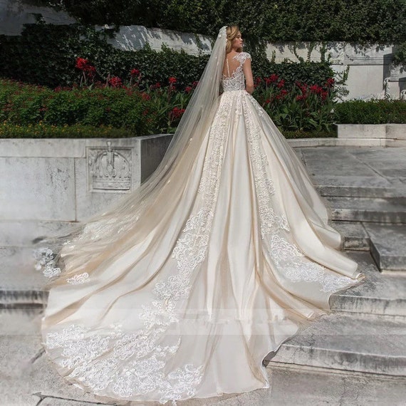 Ivory Off Shoulder Tulle Puffy Wedding Dress with Short Sleeve, Floor  Length Bridal Dress – Simibridaldresses