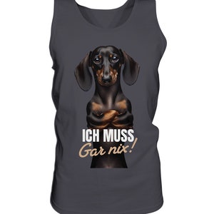 May include: A dark gray tank top with a black and brown dachshund dog with its arms crossed. The dog is looking at the camera. The text "ICH MUSS Gar nix!" is printed on the shirt.