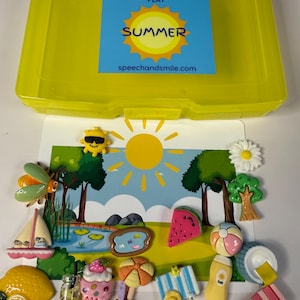 May include: A yellow plastic storage box with a blue card that reads "Say & Play SUMMER" and "speechandsmile.com." The box contains summer-themed decorative items, including a sailboat, watermelon slice, ice cream cone, and beach ball.