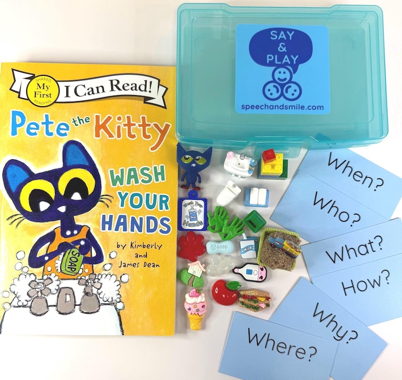 May include: A children's educational set featuring a book titled "Pete the Kitty Wash Your Hands" and a clear plastic container with various small toys and question cards. The book has a yellow cover with a blue cat illustration. The container has a blue label that says "Say & Play".