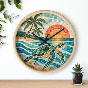 May include: A round wall clock with a light wood frame featuring a mosaic-style illustration of a sea turtle swimming in blue ocean waves near a sandy beach with palm trees and a bright orange sun setting on the horizon, complete with black hands.