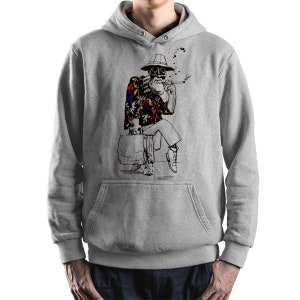 May include: A gray hooded sweatshirt with a graphic print of a cartoon man wearing a hat, sunglasses, and a floral shirt. The man is sitting on a suitcase and holding a cigarette.