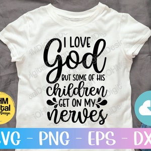 May include: White t-shirt with black text that reads "I love God but some of his children get on my nerves".