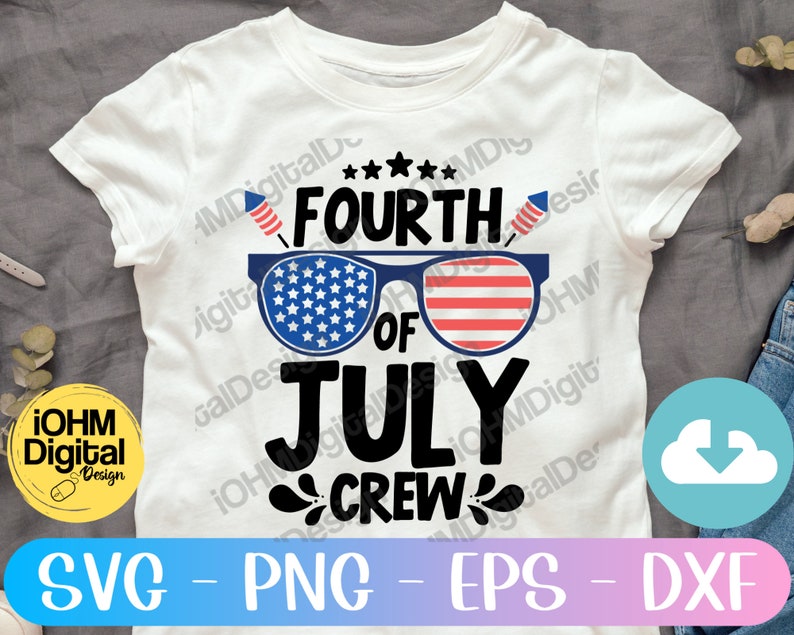 May include: White t-shirt with a Fourth of July design. The design features a pair of sunglasses with red, white and blue stars and stripes, the words "Fourth of July", and the words "Crew" in a stylised font.