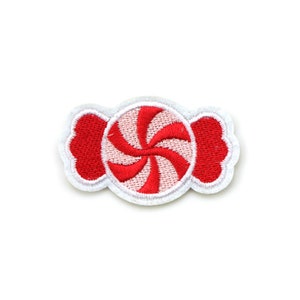 May include: An embroidered patch shaped like a wrapped candy. The center is a circular peppermint swirl with alternating red and light pink segments. The two side wrappers are solid red with white stitched borders surrounding the entire design.