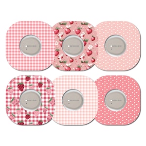 Peut inclure: Six protections adhésives pour capteur Dexcom G6 avec différents motifs. Les motifs incluent du vichy rouge, des fraises et des pois roses. Chaque protection a une découpe circulaire au centre.