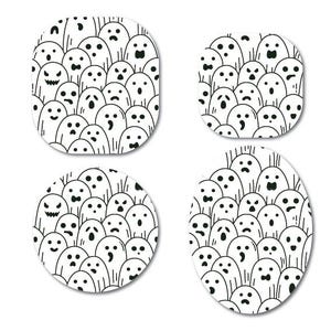 May include: Four white coasters with a black and white ghost design. Each coaster has a different shape: square, rounded square, circle, and oval. The ghosts have various facial expressions.